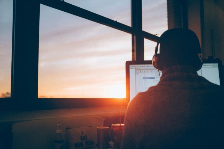 "A man showing lots of Focus while working on his computer"